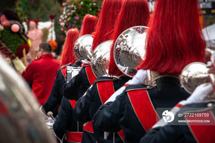 Details from a show and Marchingband or fanfare and drumband with uniforms and Instruments.