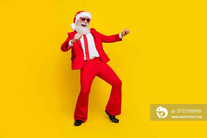 Full length photo of good mood santa dressed red suit tie dancing discotheque having fun empty space