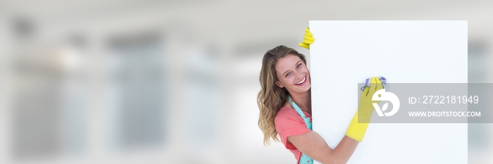 Cleaner holding white board with bright background