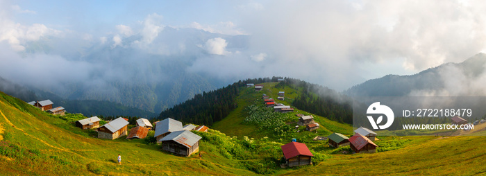 Traditional wooden houses at highlands. Landscape photo was taken in Pokut, Rize, Black Sea / Karadeniz region of Turkey. Pokut is one of Rize’s highest altitude summer resorts.