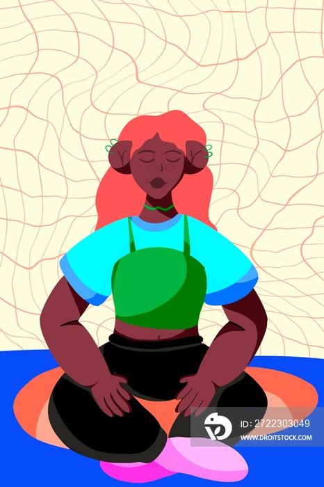 Young wavy haired woman sitting on a mat while closing her eyes to meditate