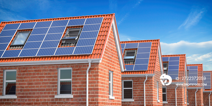 Row of house with solar panels on roof  on blue sky background.