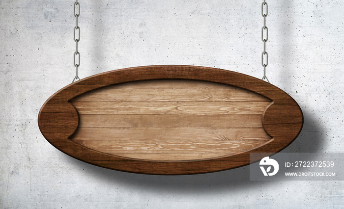 Oval wooden sign hanging on chains with concrete wall background