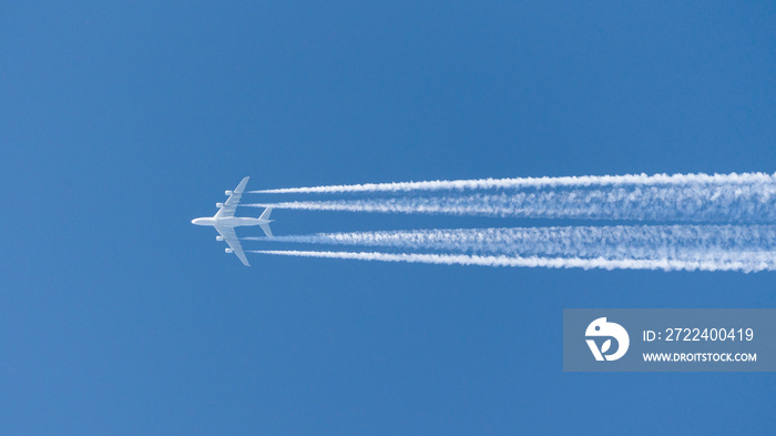 four-engined jet aircraft, jet airbus a380 airplane in the sky with condensation stripes