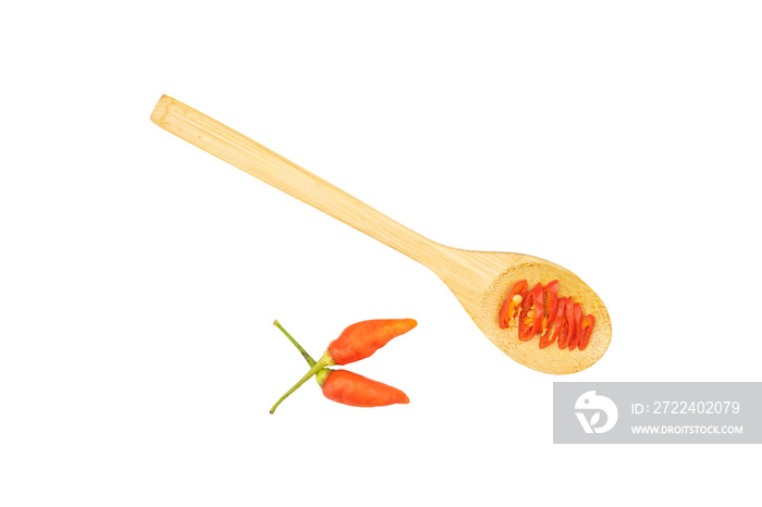 Chili in a wooden spoon isolated