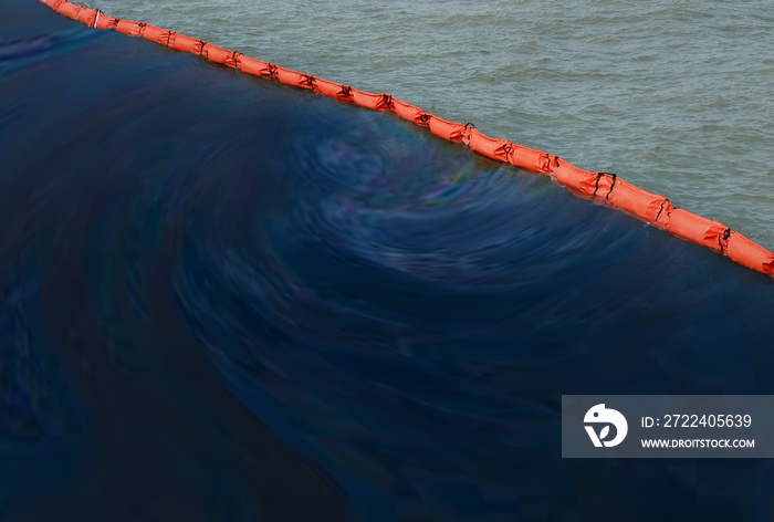 Beach pollution concept  .  A containment boom is a temporary floating barrier used to contain an oil spill. Booms are used to reduce the possibility of polluting shorelines and other resources.