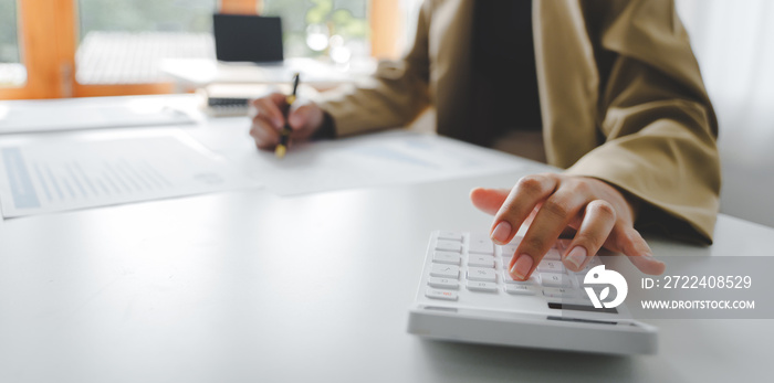 Teamwork with price chart analyzes business people on the table at the conference room.