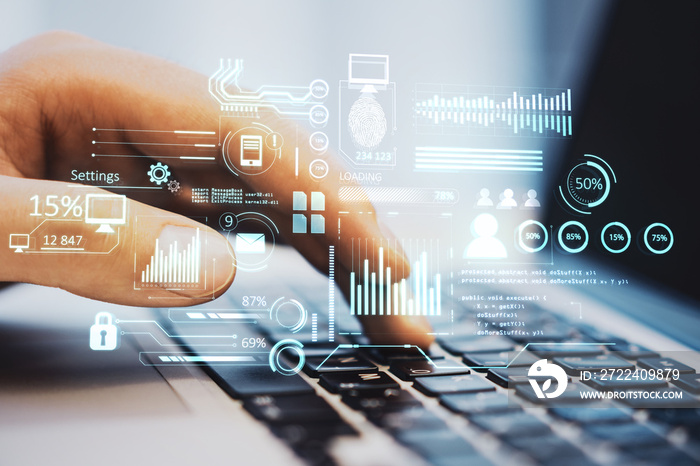 businessman hand using laptop keyboard with creative glowing business chart interface hologram on blurry background. Company digital data, guide and computer analysis concept. Double exposure.