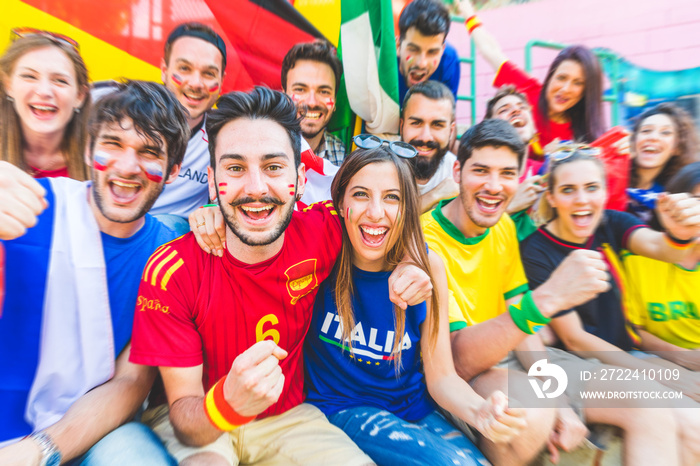 Football supporters together at stadium during a match