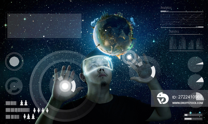 Man wearing futuristic virtual reality glasses . Elements of this image furnished by NASA.