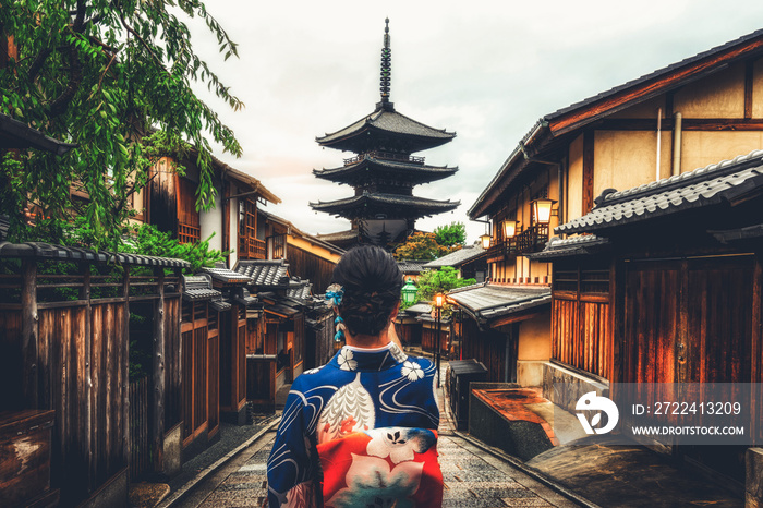 Kyoto, Japan Culture Travel - Asian traveler wearing traditional Japanese kimono walking in Higashiyama district in the old town of Kyoto, Japan.