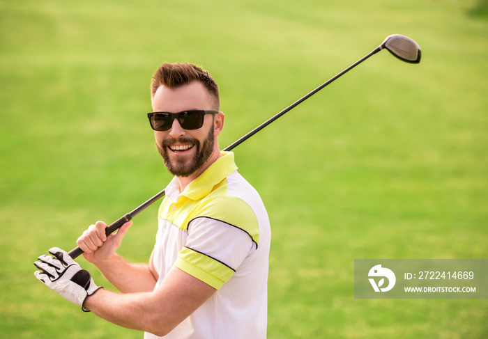 Guy playing golf