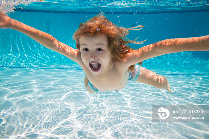 Excited kid swim underwater in pool. Child under water. Funny face portrait of child boy swimming and diving underwater with fun in pool. Summer fun with children. Family summer vacation.