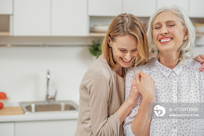 Joyful family hugging with gentleness