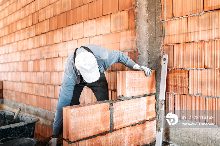 masonry details - professional constructor, worker building interior walls