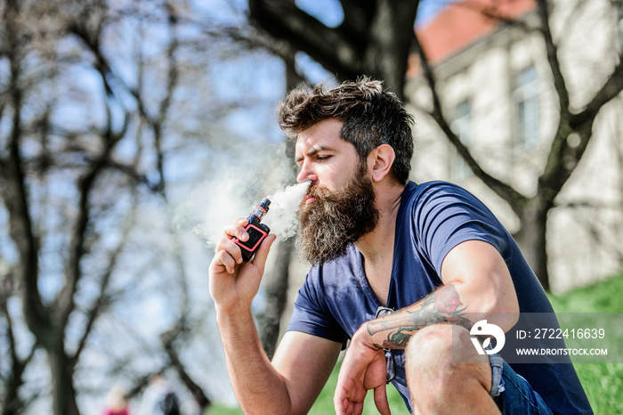 Perfect style. Health safety and addiction. inhaling vapor. man smoking e-cigarette. Mature hipster with beard. Bearded brutal male smoking electronic cigarette. hipster man hold vaping device