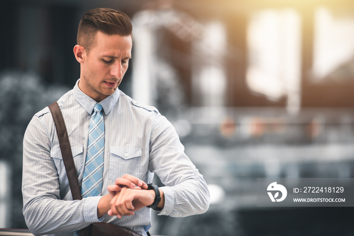 Businessman Looking on His Watches with Serious Face in Rush Hour - Business and Urban Lifestyle Concept