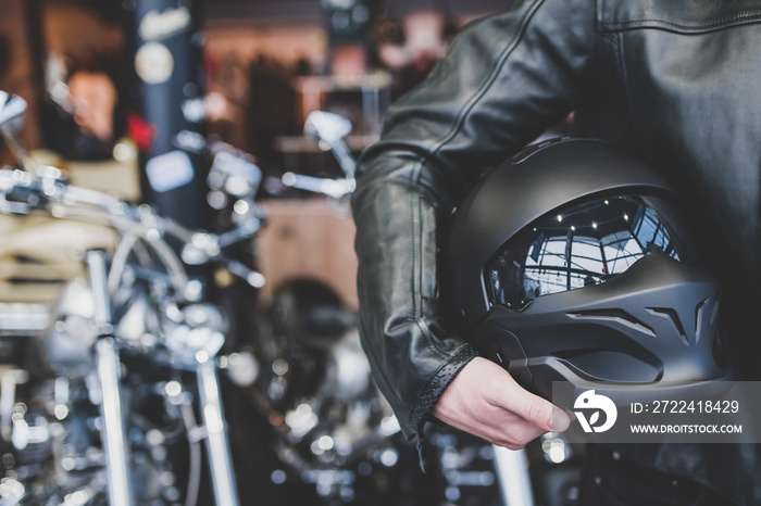 Man in motorcycle shop