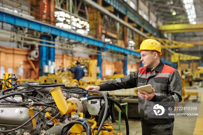 Worker working with equipment in the plant