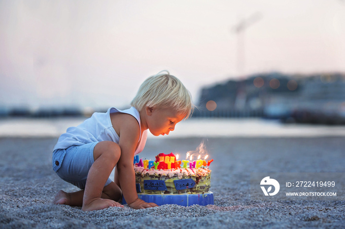 Sweet boys, celebrating on the beach birthday with car theme cake and decoration