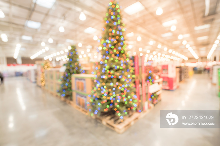 Abstract blurred huge Christmas tree decoration at wholesale hypermarket in America