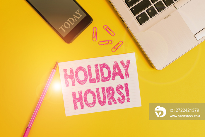 Word writing text Holiday Hours. Business photo showcasing Overtime work on for employees under flexible work schedules Trendy open laptop smartphone marker paper sheet clips colored background