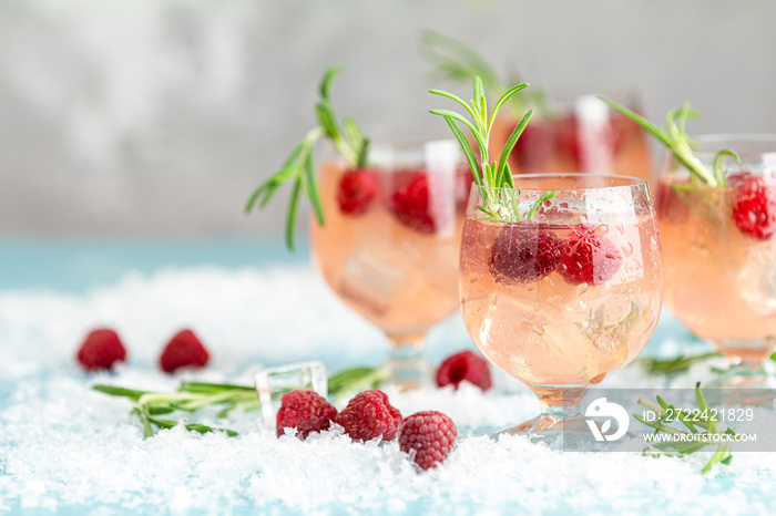 Christmas pink drink raspberry with rosemary and ice