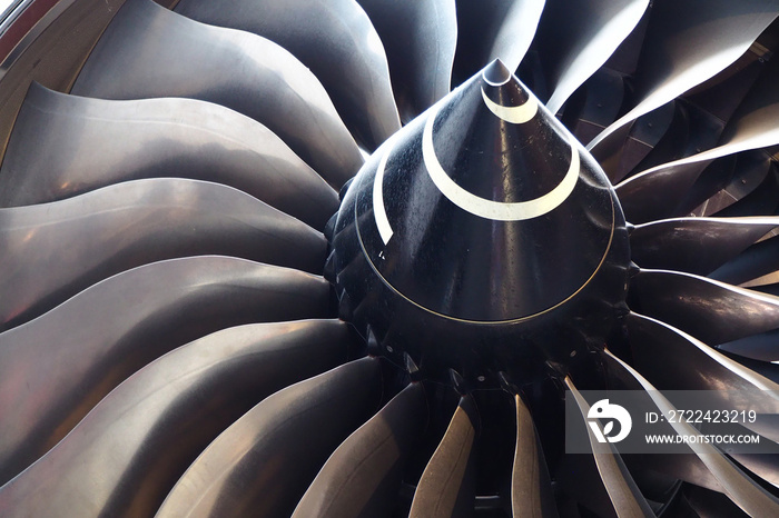 close up of the propeller of a jet aeroplane engine.  The very tip of a propellor ideal as a background texture or to show the working of a plane.