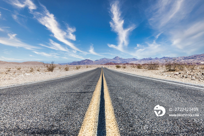 Route 66 in the desert with scenic sky. Classic vintage image with nobody in the frame.