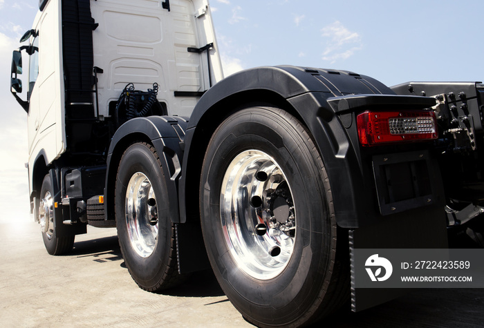 Rear of Semi Truck Wheels Tires. New Rubber Tyres. Chrome Wheels. Freight Trucks Transport. Auto Repair Service Shop.