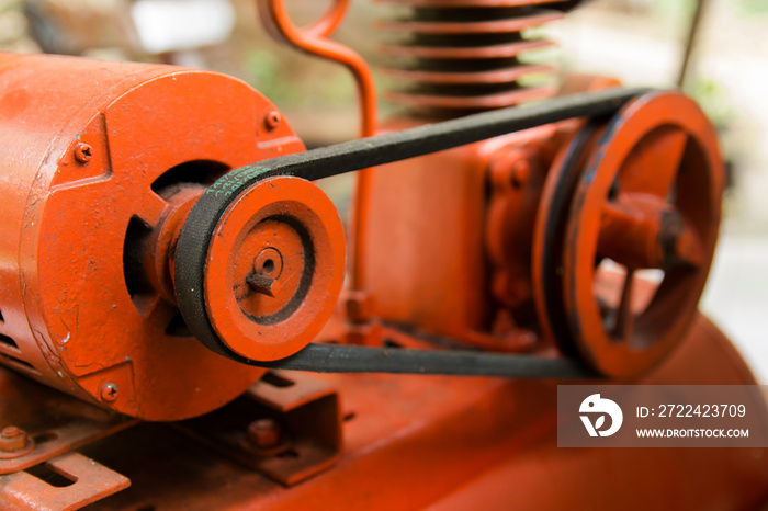 close up pulley and belt drive. machine composed of pulley and a belt.