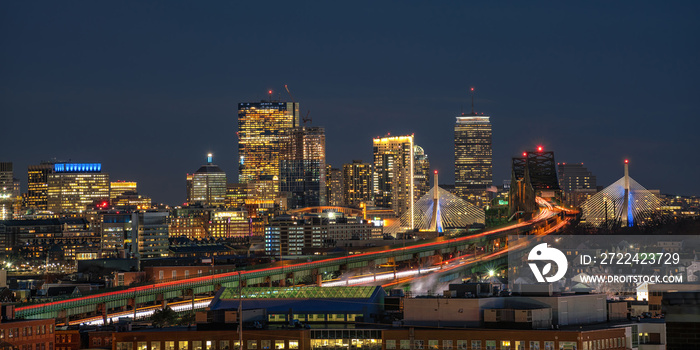 panorama for banner of Boston skyline which can see Zakim Bridge and Tobin Bridge with express way over the Boston Cityscape at twilight time, USA downtown skyline, Architecture and building concept