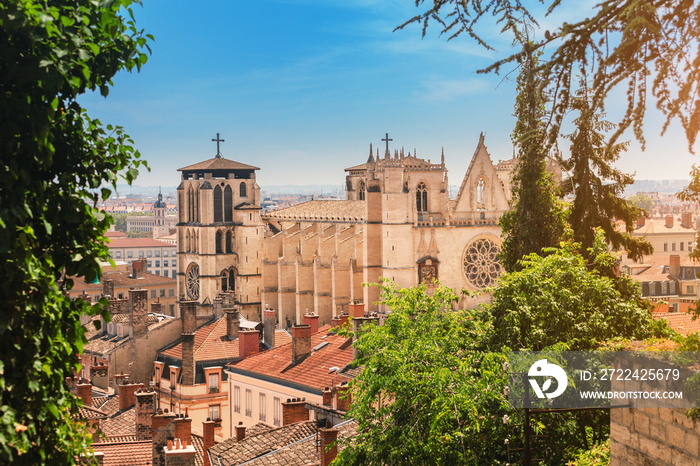 Cityscape view of Lyon Jean Baptist Cathedral at hot summer day. Main travel and tourist destination in the city.