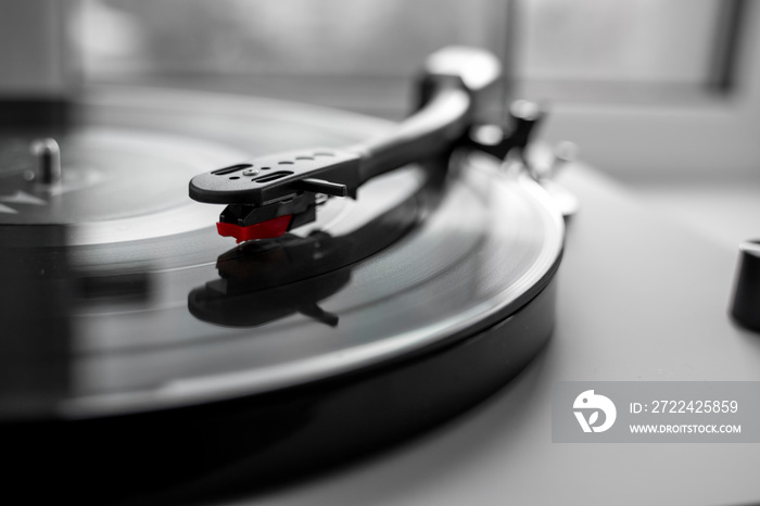 Vinyl turntable on a white background. Retro audio equipment for vinyl disk.