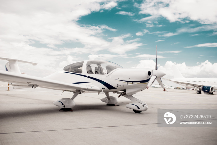 Propeller airplane in airport, plane on parking