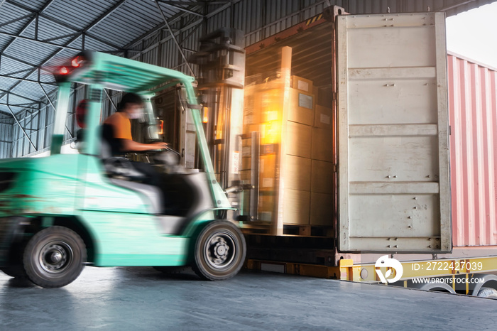 Forklift Tractor Loading Cargo Boxes at Dock Warehouse. Shipment. Packaging Boxes Supply Chain. Distribution Warehouse Shipping. Lorry. Cargo Freight Truck Transport Logistics.