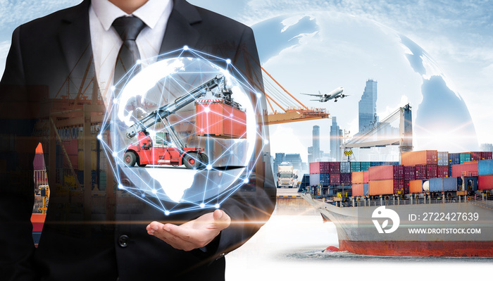 Businessman holding digital globe in palm for logistics import export background and container cargo freight ship transport concept