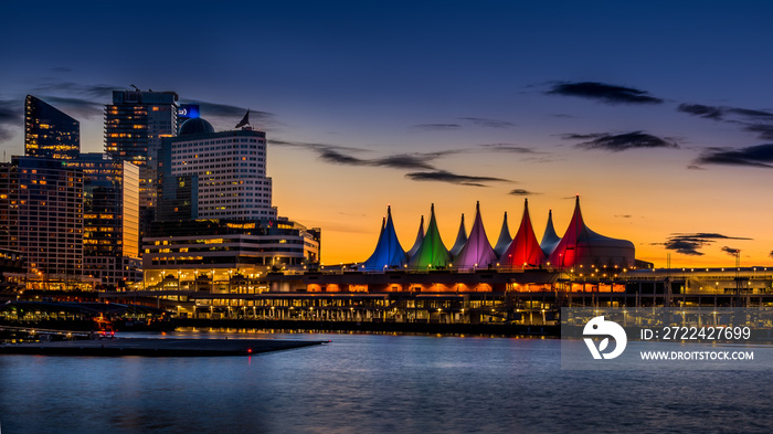 Blue Hour after the Sun has set over the Harbor and the Colorful Sails of Canada Place, the Cruise Ship Terminal and Convention Center on the Waterfront of Vancouver, British Columbia, Canada