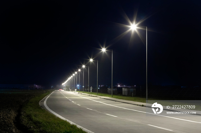 a long row of modern LED street lights