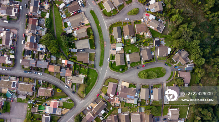 Top down aerial view of urban houses and streets in a residential area of a Welsh town