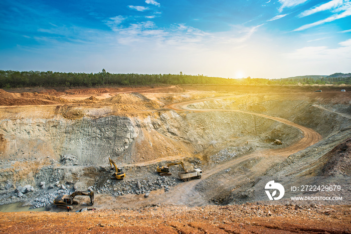 Aerial view of opencast mining quarry with lots of machinery at work - view from above.This area has been mined for copper, silver, gold, and other minerals,Thailand