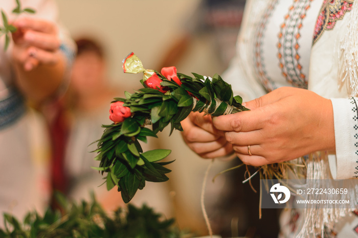 Wedding traditions in Ukraine, periwinkle wreath for the bride on her wedding day from her parents.