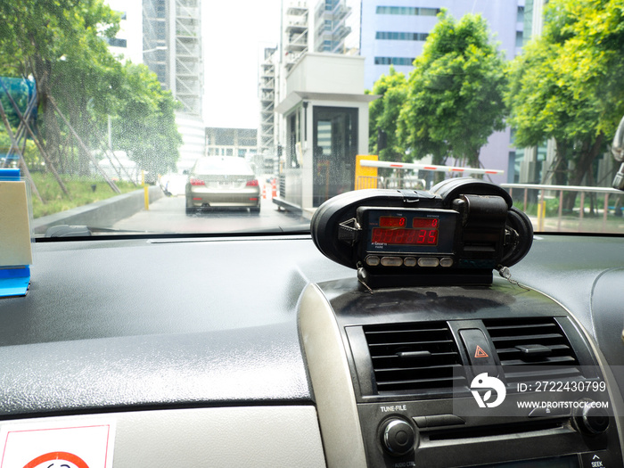 View from cab with meter display Time, Distance and Fare in dashboard interior