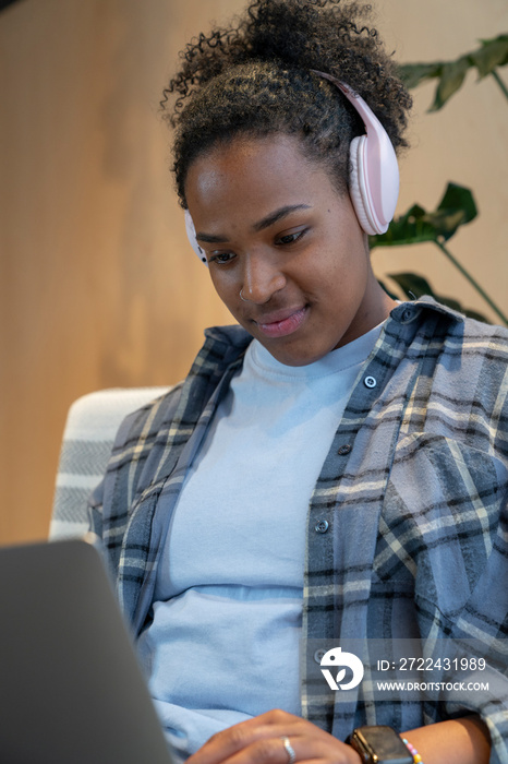 Young businesswoman during video call in office