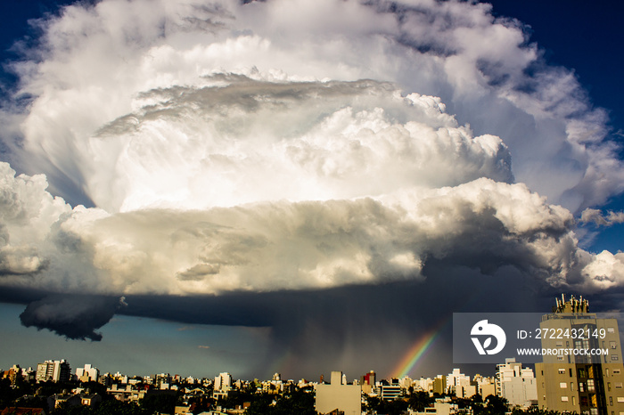 cumulonimbus clouds over city