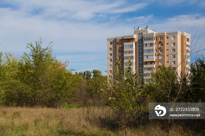 New area with a typical residential new building. Urban Architecture. Background with copy space