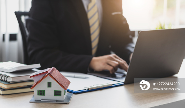 Concept image of real estate legal advisor working in a lawyer’s office.