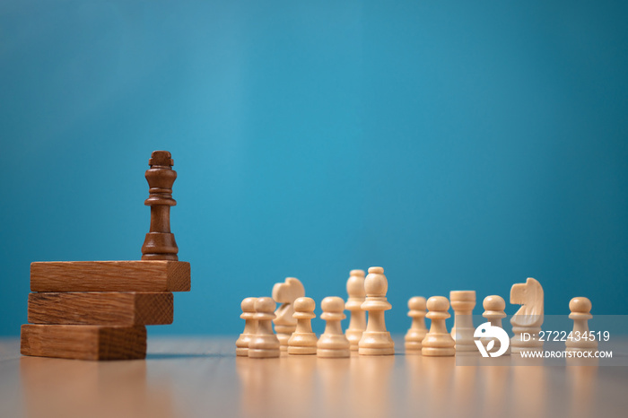 Brown king chess standing on a wooden stand. The concept of Leaders in good organizations must have a vision and can predict business trends and assess competitors