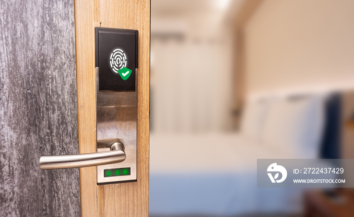 Fingerprint smart door system with bedroom background. Technology of security in hotel concept.