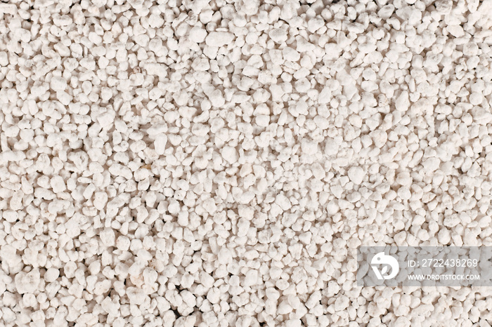 Perlite, a volcanic glass mineral with low density often used for soil amendment to prevent compaction when growing plants